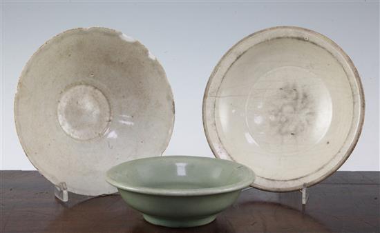 A Ding ware dish, a Yingqing bowl and a Longquan celadon dish, 12th - 15th century, 14cm